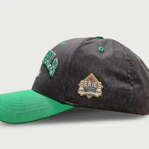 side view of black and green mitchelles plain cap